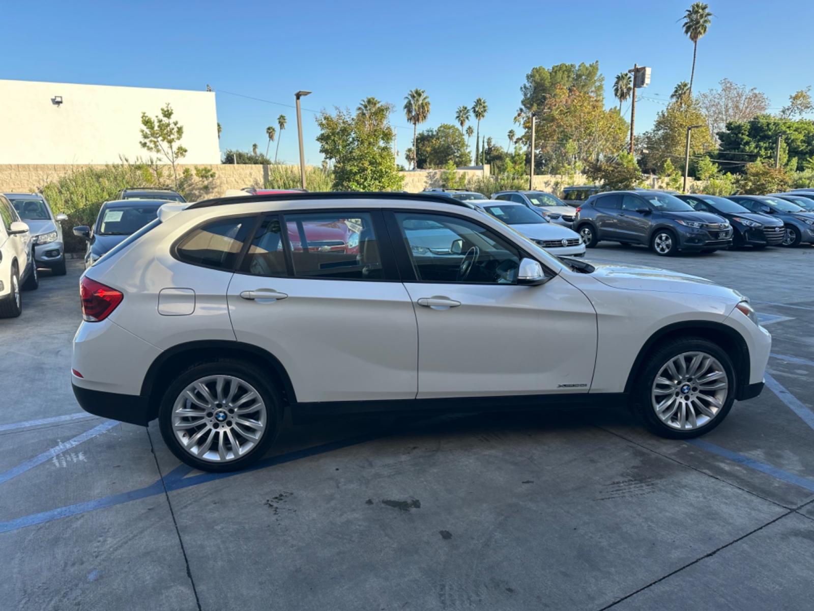 2014 WHITE /Black BMW X1 Leather (WBAVL1C56EV) with an 4 Cylinders engine, AUTOMATIC transmission, located at 30 S. Berkeley Avenue, Pasadena, CA, 91107, (626) 248-7567, 34.145447, -118.109398 - Don't let bad credit or financial setbacks hold you back from owning a luxury SUV like the 2014 BMW X1 xDrive28i. At our BHPH dealership, we're here to make the car-buying process as smooth and stress-free as possible. We invite you to visit our dealership in Pasadena, CA, to explore our inventory o - Photo #5